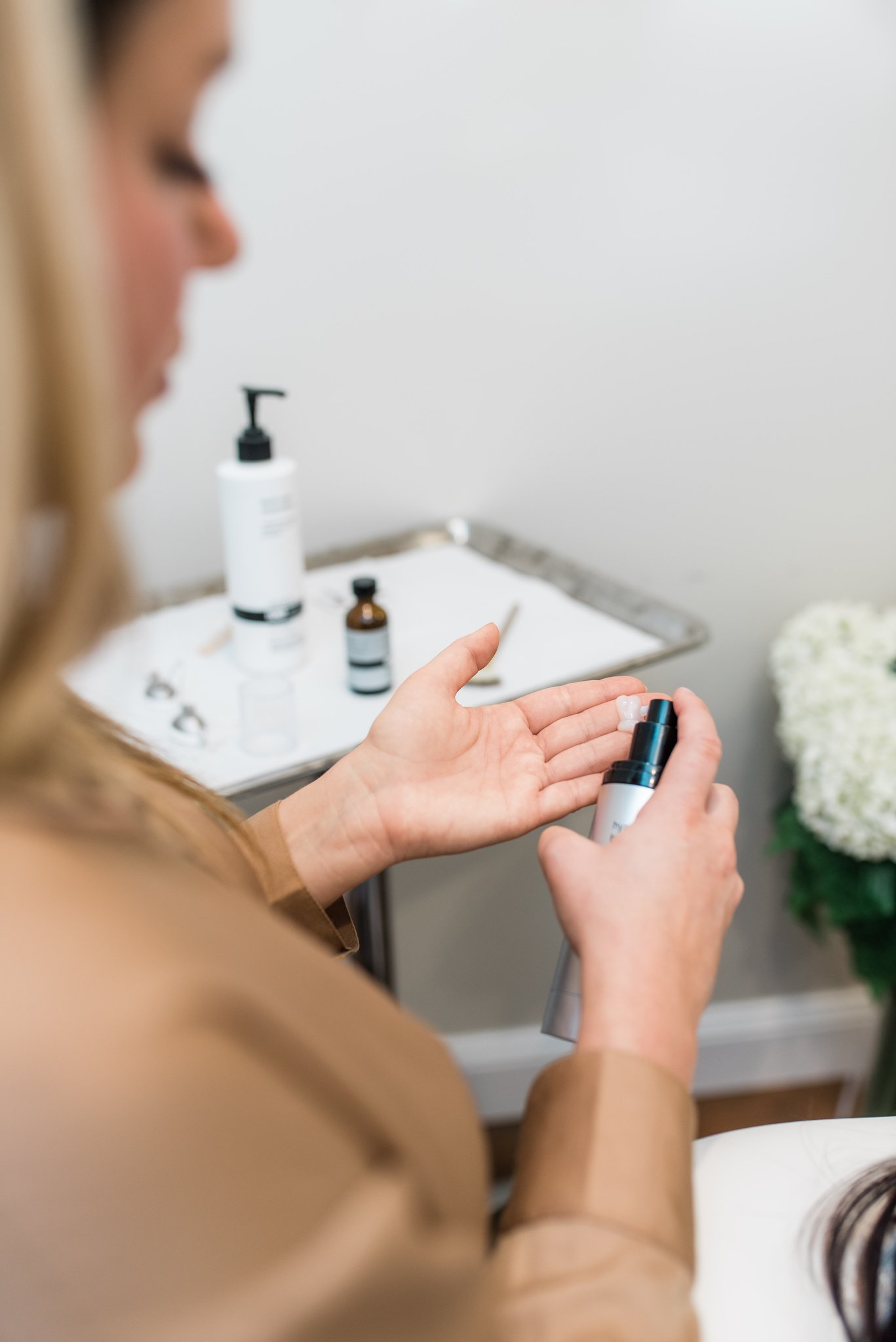 esthetician applying skincare products on client at Radiance Medical Spa in Williston, VT