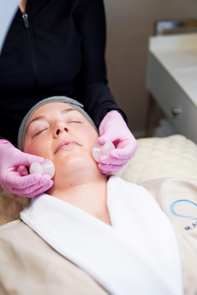Client receiving a facial